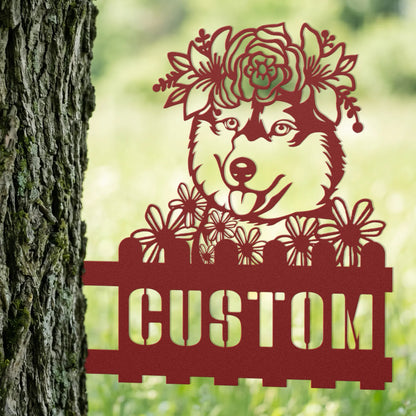 Decorative metal sign of a dog with flowers and 'CUSTOM' text against a natural background.